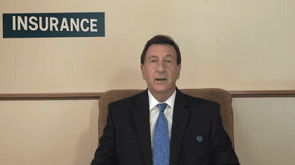 Insurance agent recording a personalized annual policy renewal video